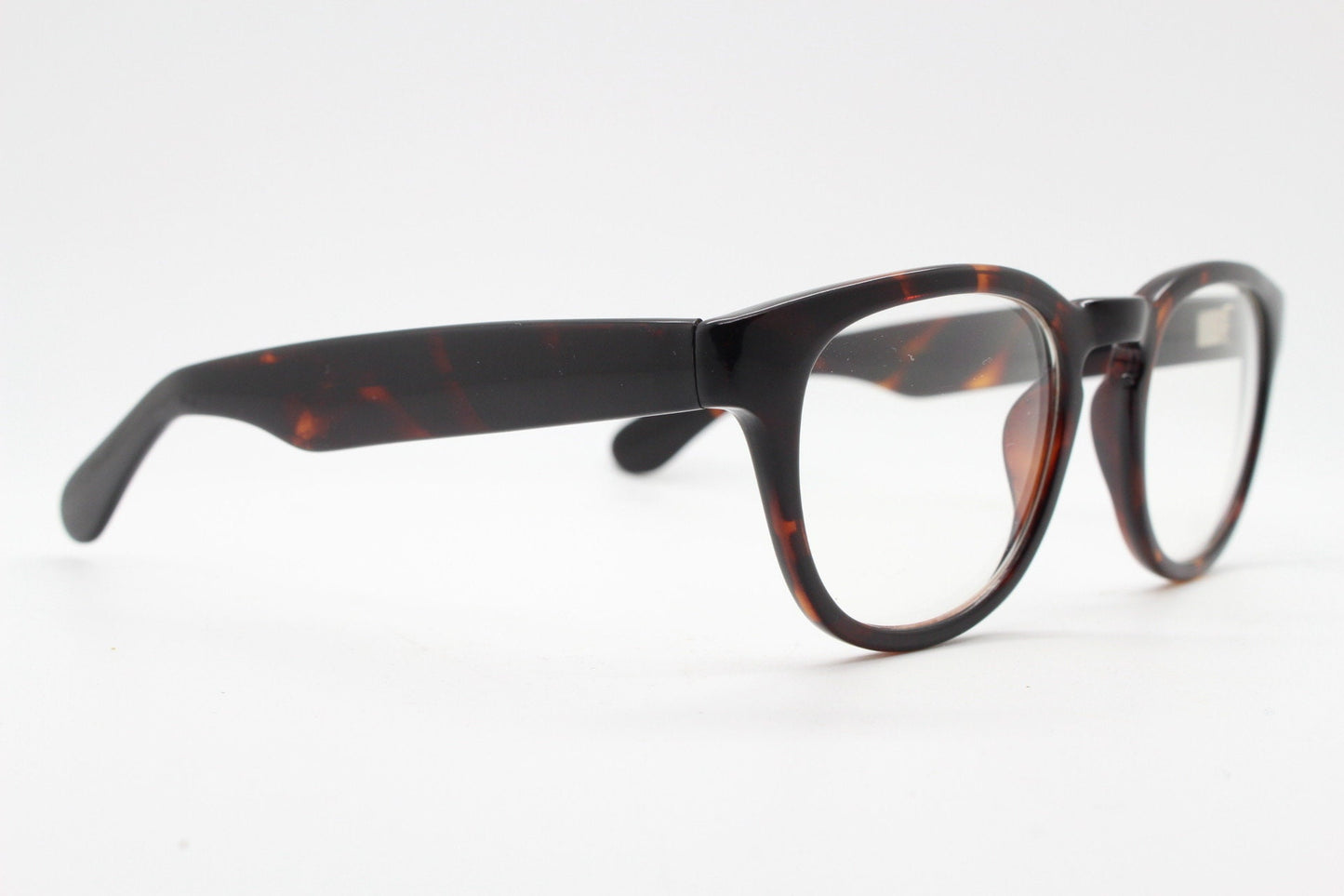 80s vintage modified wayfarer style glasses. Tortoise optical frames with keyhole bridge and clear lenses. 40s, 50s style NOS eyeglasses