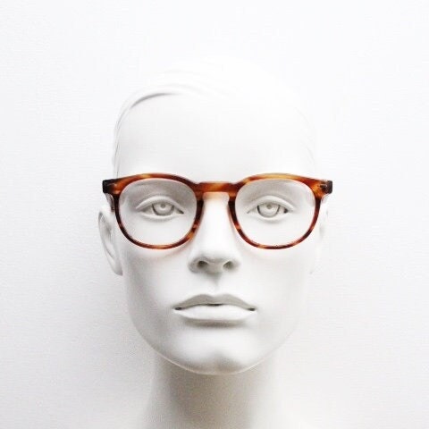 80s vintage modified wayfarer style glasses. Tortoise optical frames with keyhole bridge and clear lenses. 40s, 50s style NOS eyeglasses