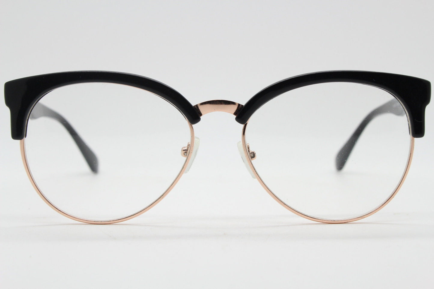 90s vintage modified cat eye glasses. Black gloss browline half frame eyeglasses with gold underwire. 50s, 60s design cateye. NOS