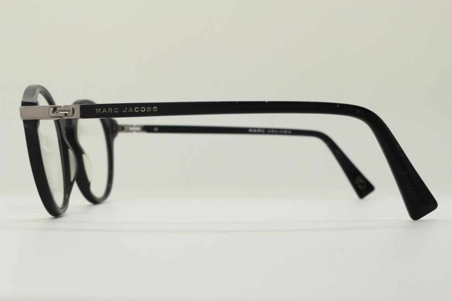 Marc Jacobs round eye glasses in plain black satin finish acetate. Strong fashion look optical frames. Prescription RX spectacles