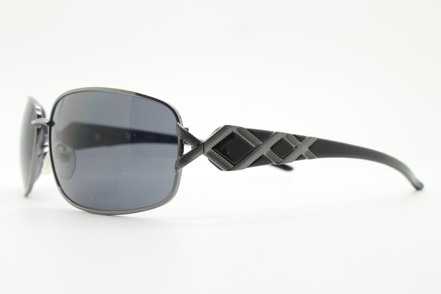 2000s vintage rectangular bug eye sunglasses. Solid metal slightly oversized grey chrome frame with diamond lattice arm detail. Y2K NOS