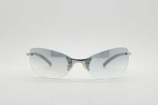 Y2K vintage wraparound sunglasses. Low profile frameless design in black matt finish with light tone graduated mirror lenses. 2000's. NOS