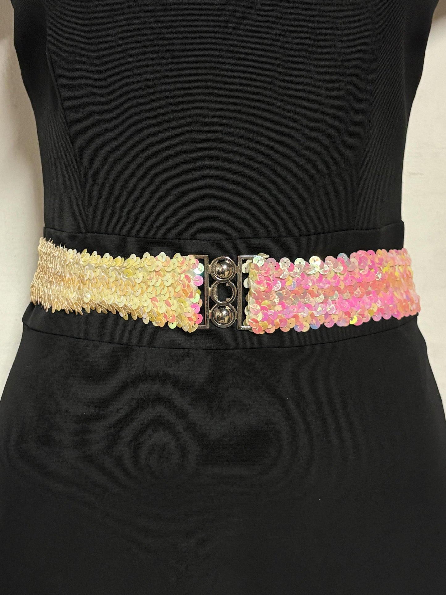 70s vintage womens elastic pink and white sequin stretch belt with chrome circles buckle. To wear with a dress. Authentic disco belt