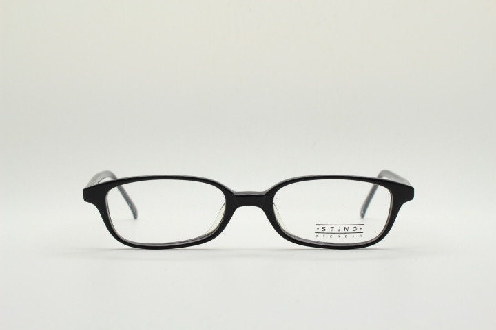 Sting 90s vintage rectangular eye glasses made in Italy. Plain black gloss low profile acetate optical frames. Prescription RX. NOS