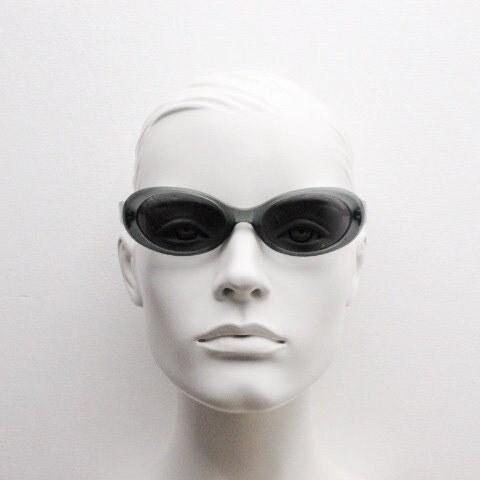 Giorgio Armani 90s vintage oval sunglasses made in Italy. Transparent grey\blue acetate frame with matching lenses. Small bug eye. Y2K