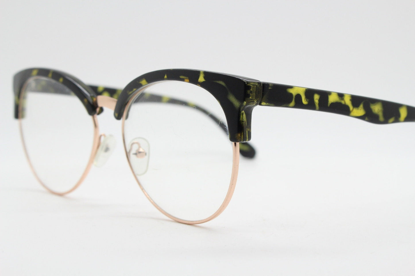 90s vintage modified cat eye glasses. Tortoise browline half frame eyeglasses with gold underwire. 50s, 60s design cateye. NOS