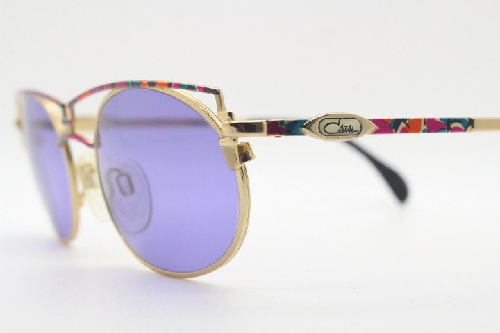 Cazal 90s vintage sunglasses made in Germany. Dynamic multi colour enamelled frame with custom ordered unique purple lenses