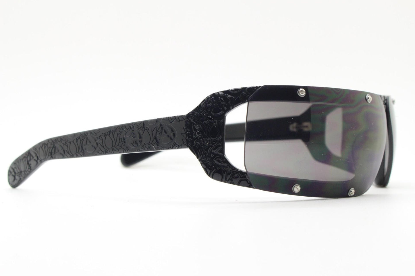 Buddhist Punk wrap around sunglasses hand made by Linda Farrow. Black acetate frame with abstract cut out patterns. Projects. Vintage. NOS