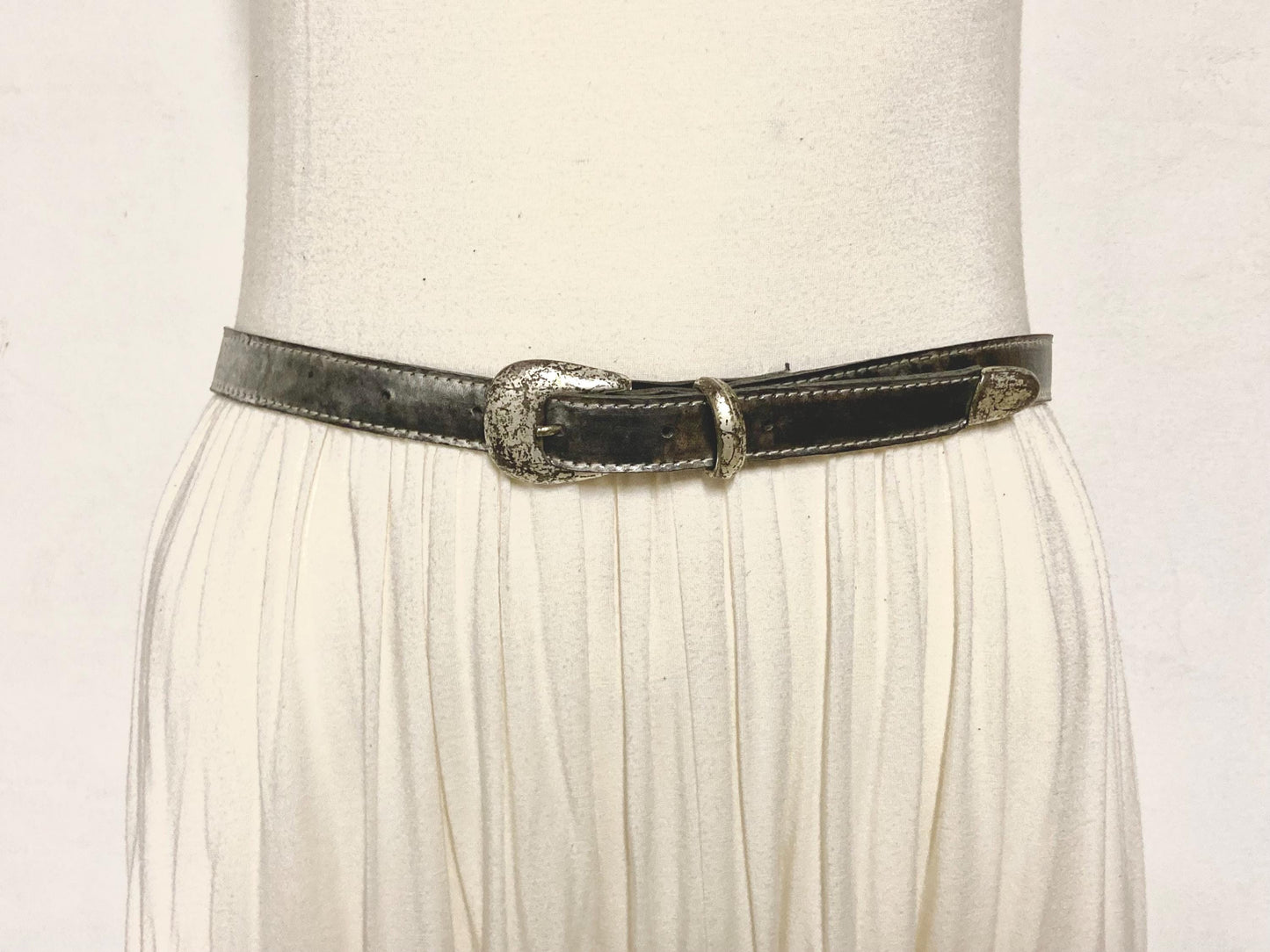 90s vintage womens dress or jeans / trousers belt in distressed worn metal looking finish. Vinyl on leather construction. Made in France