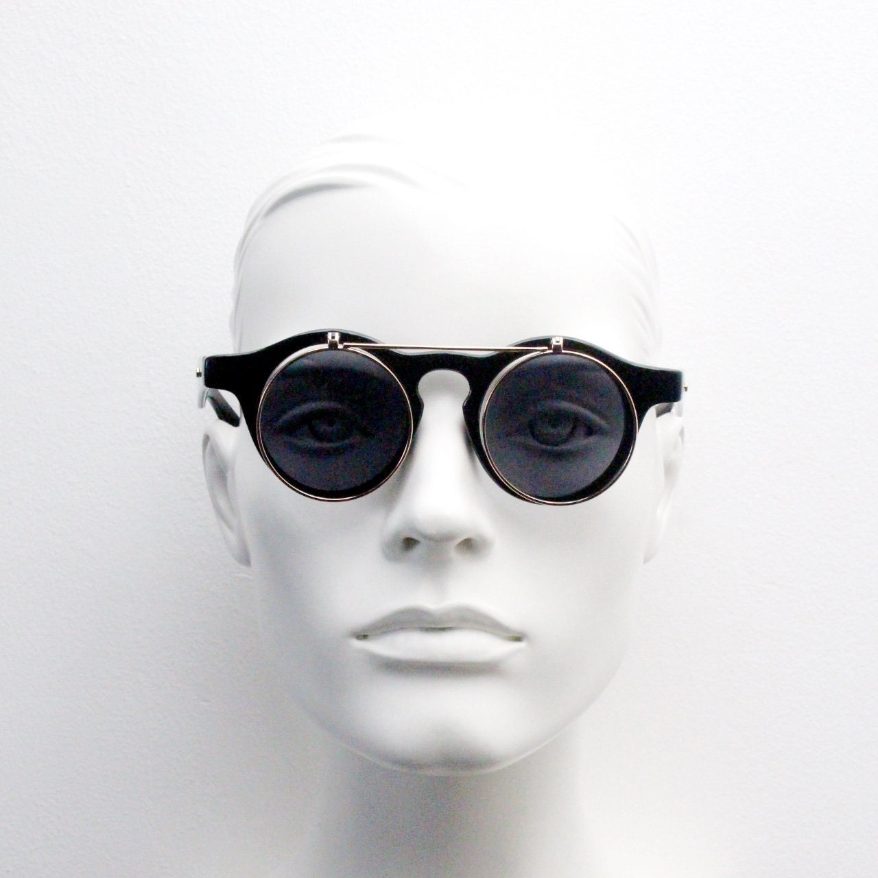 Vintage 90s round flipper sunglasses. 30s style black frame with clear lenses and flip up sunglasses visor. BNWT unused