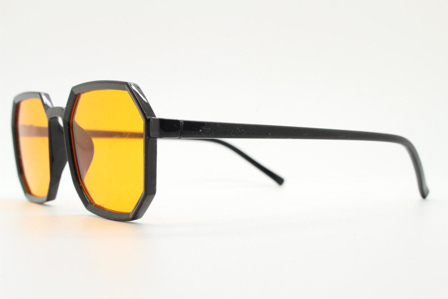 Vintage octagon sunglasses. Well proportioned subtle 8 sided black gloss frame with intense orange lenses. Rave. BNWT. NOS