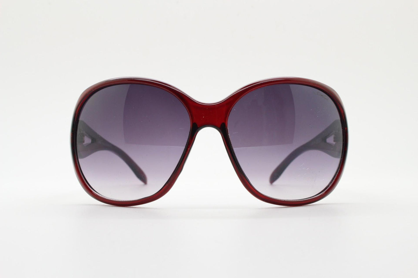 Y2k vintage oversized womens sunglasses. Big bug eye 70s design in deep red with metal arm detail. Authentic 2000s retro. NOS
