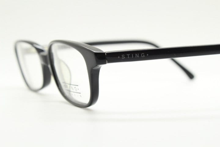 Sting 90s vintage rectangular eye glasses made in Italy. Plain black gloss low profile acetate optical frames. Prescription RX. NOS