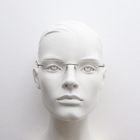 Silhouette rectangular frameless eye glasses made in Austria. Minimal lightweight optical frame with silver trim. Prescription RX
