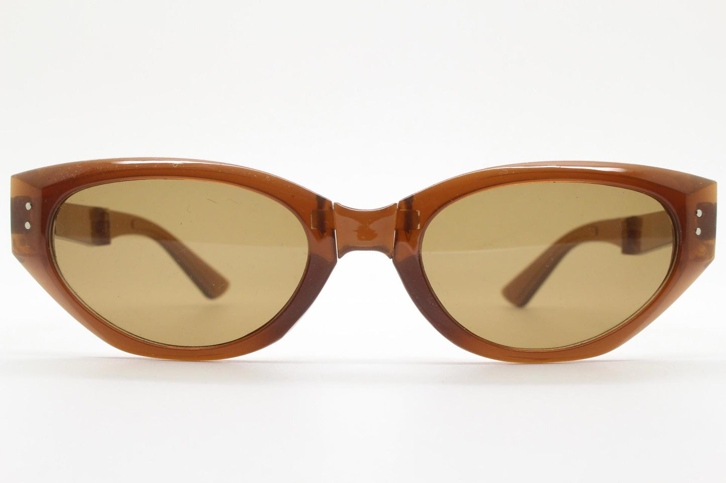 Vintage foldable cat eye sunglasses. Transparent brown folding compact cateye frame. Neat and clever folder design. Y2K NOS