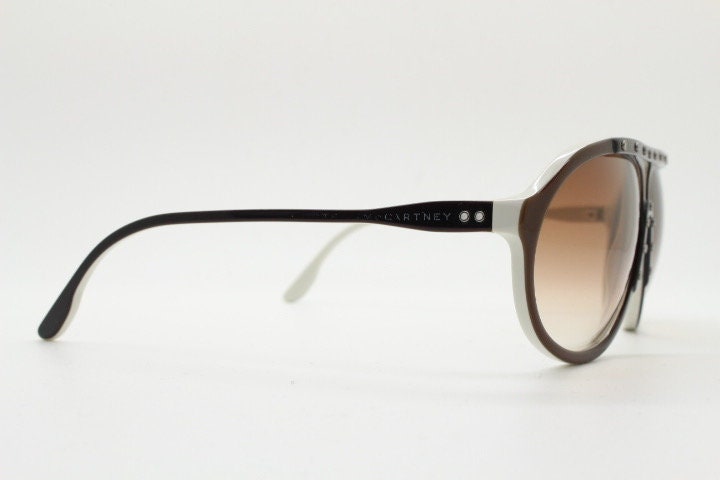 Stella Mc Cartney vintage aviator sunglasses. Small brown and white acetate aviators with graduating lens and white studs. Pilot. Teardrop