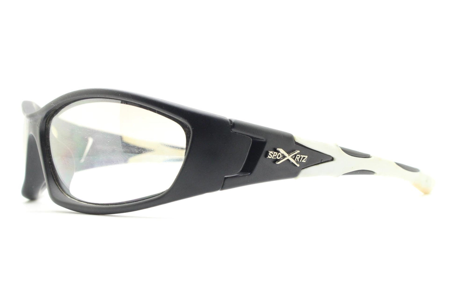 90s vintage sports sunglasses. Black matt aerodynamic wraparound with straight white rubber arms and light tone lenses. Y2K rave shield