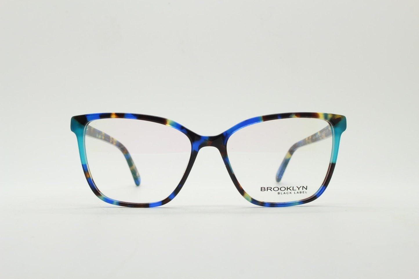Modified cat eye glasses by Brooklyn. Vibrant blue and brown tones gloss optical frames.  Prescription eyeglasses. RX cateye spectacles