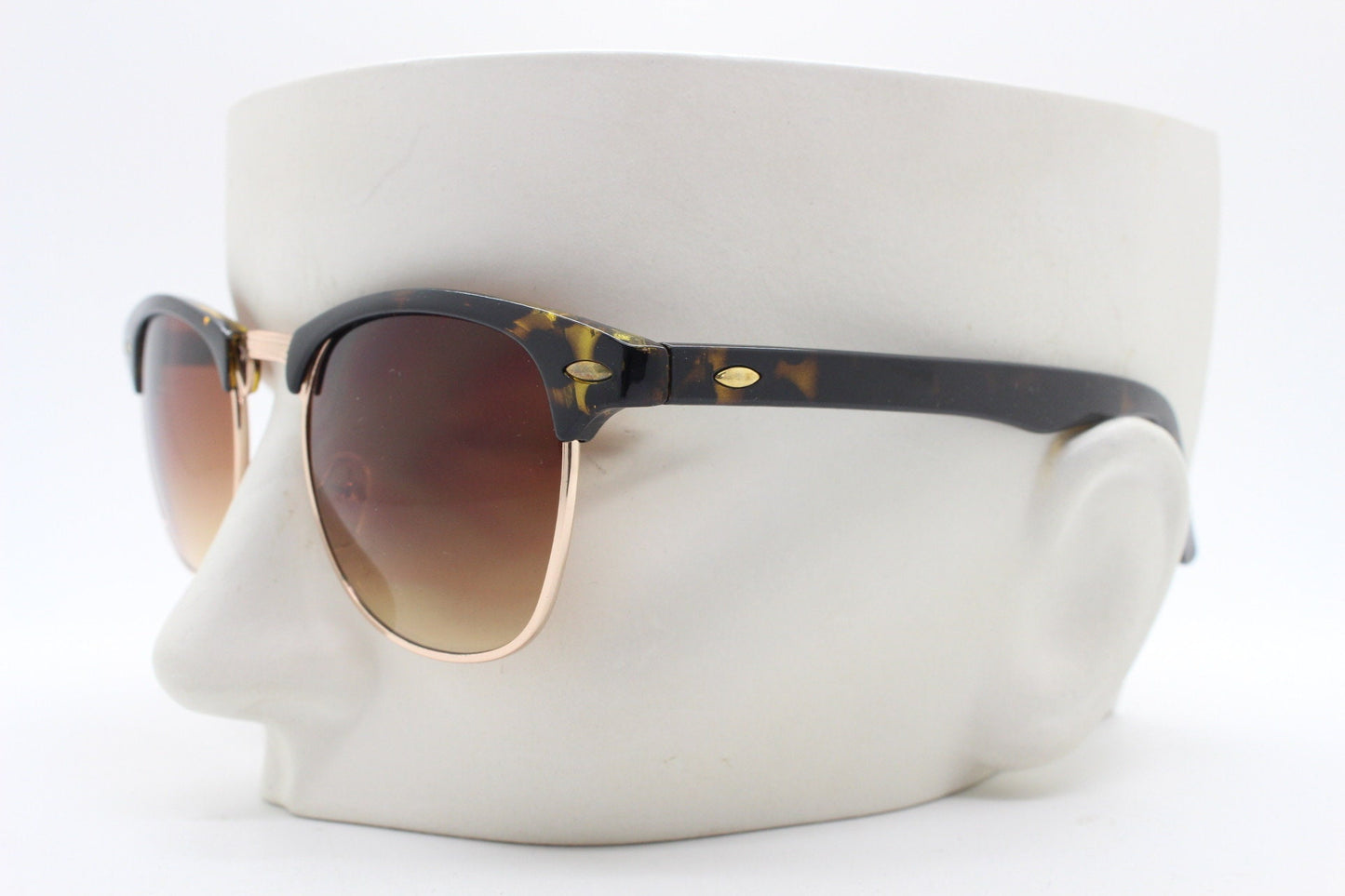 90s vintage browline sunglasses. All time classic design in tortoise gloss with gold half rim. 50s, 60s. Unused NOS