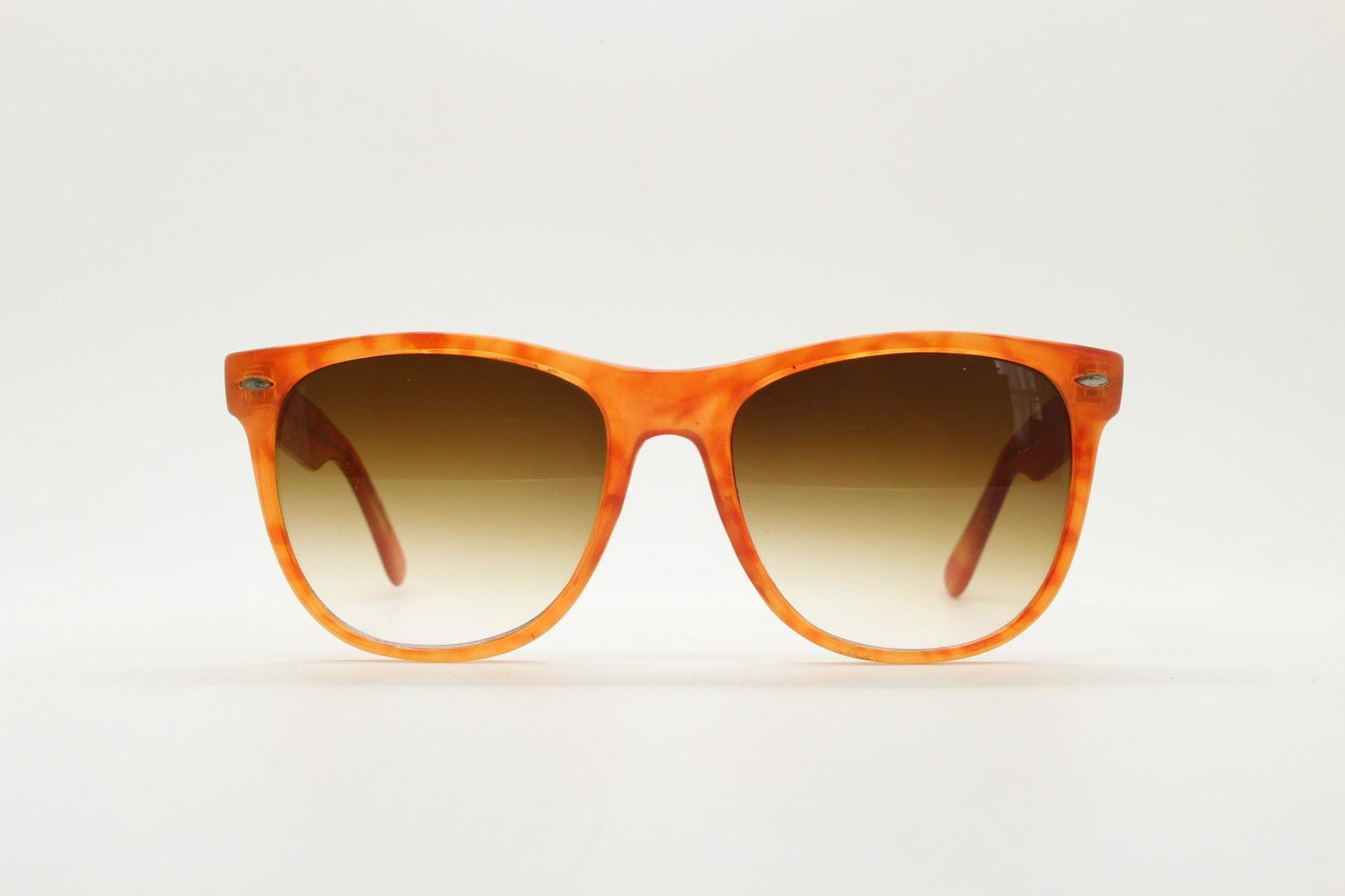 Vintage 80s square horn rim sunglasses. All time classic Wayfarer design in vibrant orange frame and superb graduating lenses