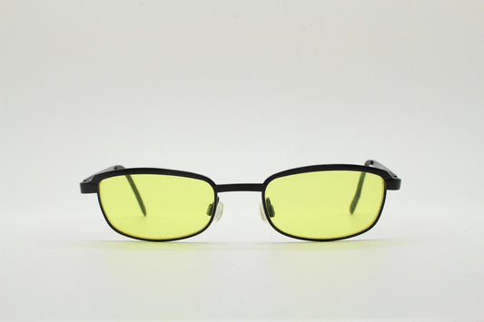 Vintage small rectangular sunglasses. Authentic quirky 90s design in a matt black solid metal frame with bright yellow lenses. 2000s. NOS