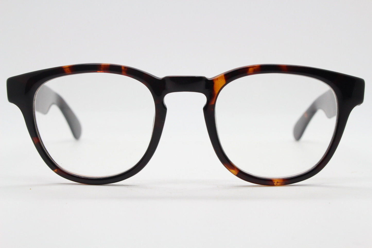 80s vintage modified wayfarer style glasses. Tortoise optical frames with keyhole bridge and clear lenses. 40s, 50s style NOS eyeglasses