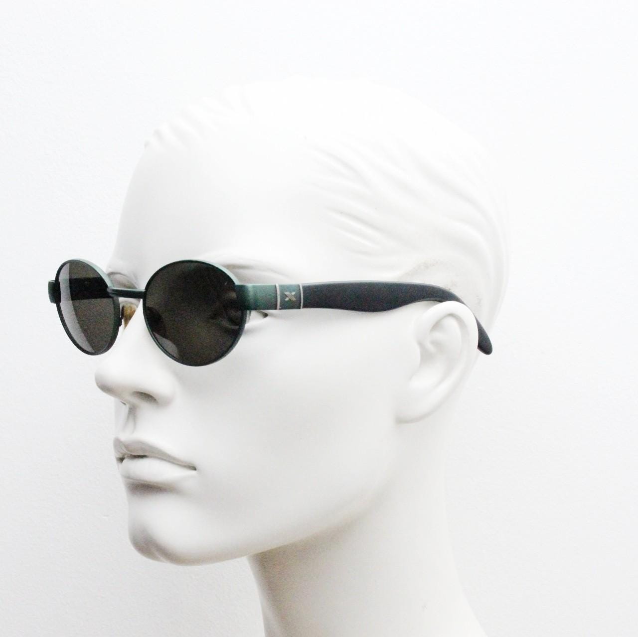 Safilo for Oxydo 90s vintage oval sunglasses made in Italy. Green matt finish solid metal frame with black arms and green lenses. Unused NOS