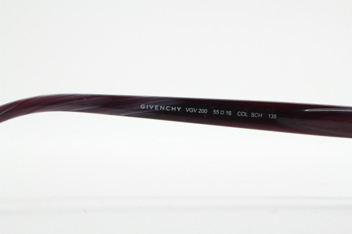 Givenchy rectangular frameless eye glasses made in Italy. Minimal optical frame with marbled brown arms. Prescription RX spectacles. Vintage