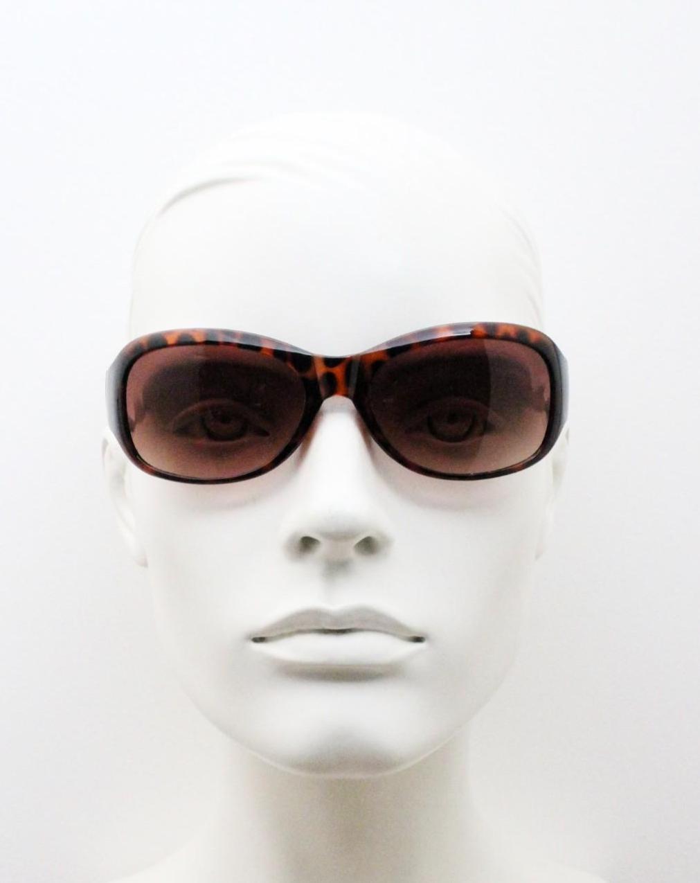 Y2k vintage wrap around bug eye sunglasses. Curved tortoise gloss frame with gradient Havana brown lenses. 2000's NOS