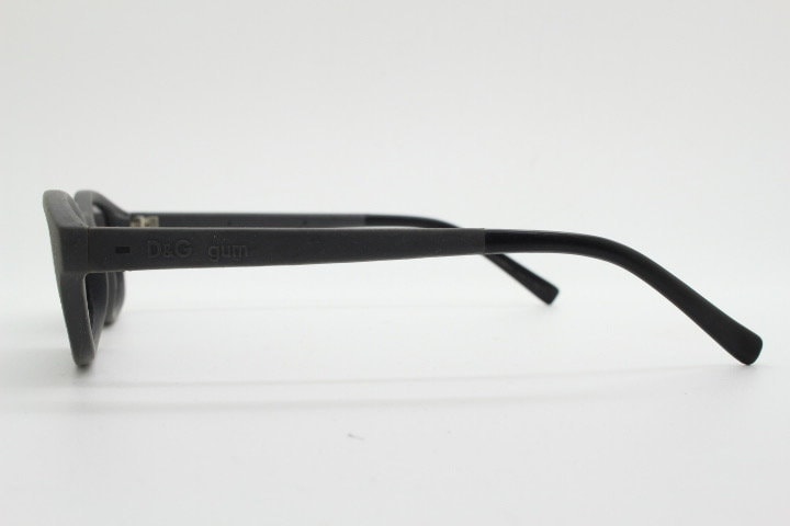 Dolce and Gabbana gum sunglasses made in Italy. Mens 90s vintage innovative flexible grey rubber frame with black lenses