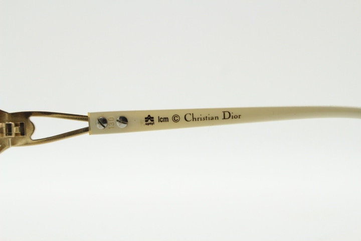 Christian Dior 70s vintage big round eye glasses made in Austria. Brown Optyl optical frames with distinctive logo. Prescription RX. NOS