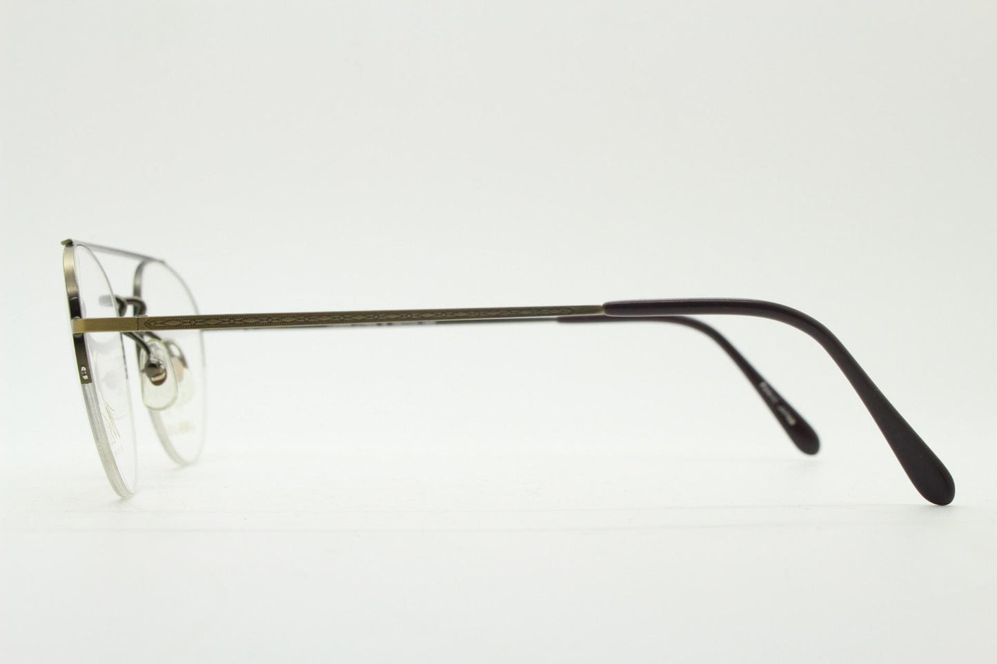 90s vintage round eye glasses made in Japan by Welling. Brushed bronze finish optical half frame. Prescription RX spectacles. NOS
