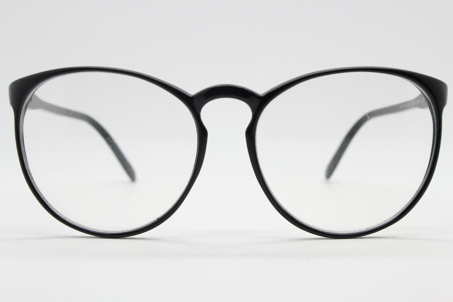 80s vintage black round glasses. Slightly oversized slim optical frames. Prescription eyeglasses with clear lens. RX spectacles
