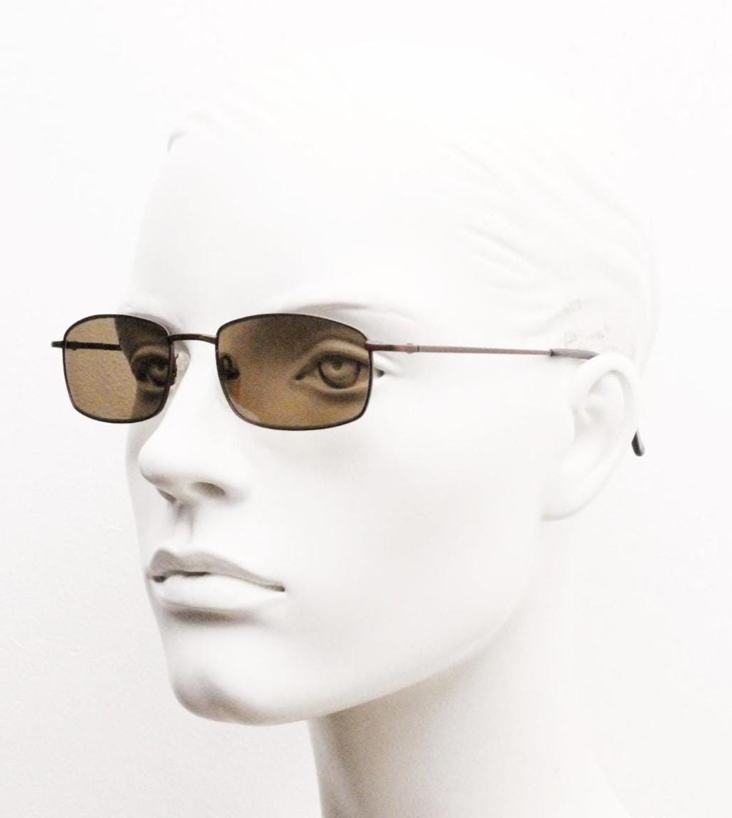 90s vintage rectangular low profile metal sunglasses. Minimal slim metal frame in satin bronze finish with plain brown lenses. NOS. BNWT
