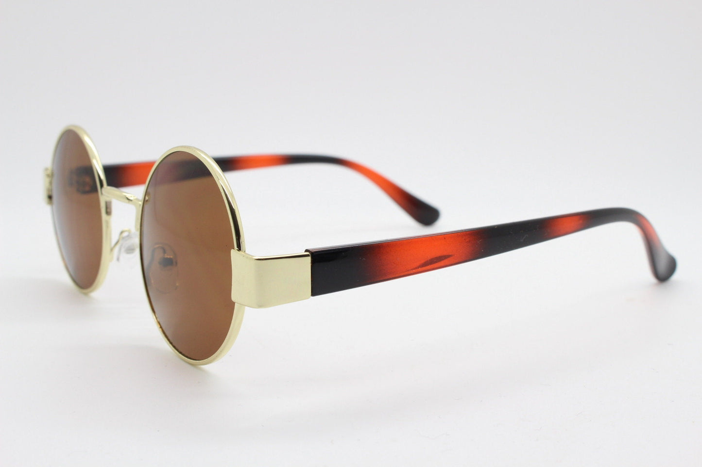 90s round vintage sunglasses. Gold 1920's style frame with tiger pattern arms and brown lenses. Unused. BNWT