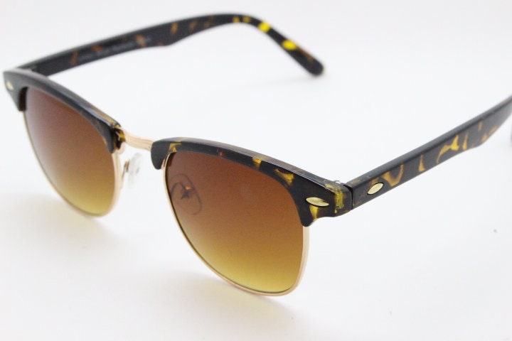 90s vintage browline sunglasses. All time classic design in tortoise gloss with gold half rim. 50s, 60s. Unused NOS