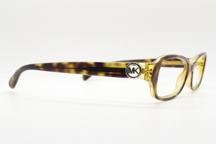 Michael Kors vintage rectangular eye glasses. Tortoise layered acetate low profile cateye optical frame. Womens prescription spectacles