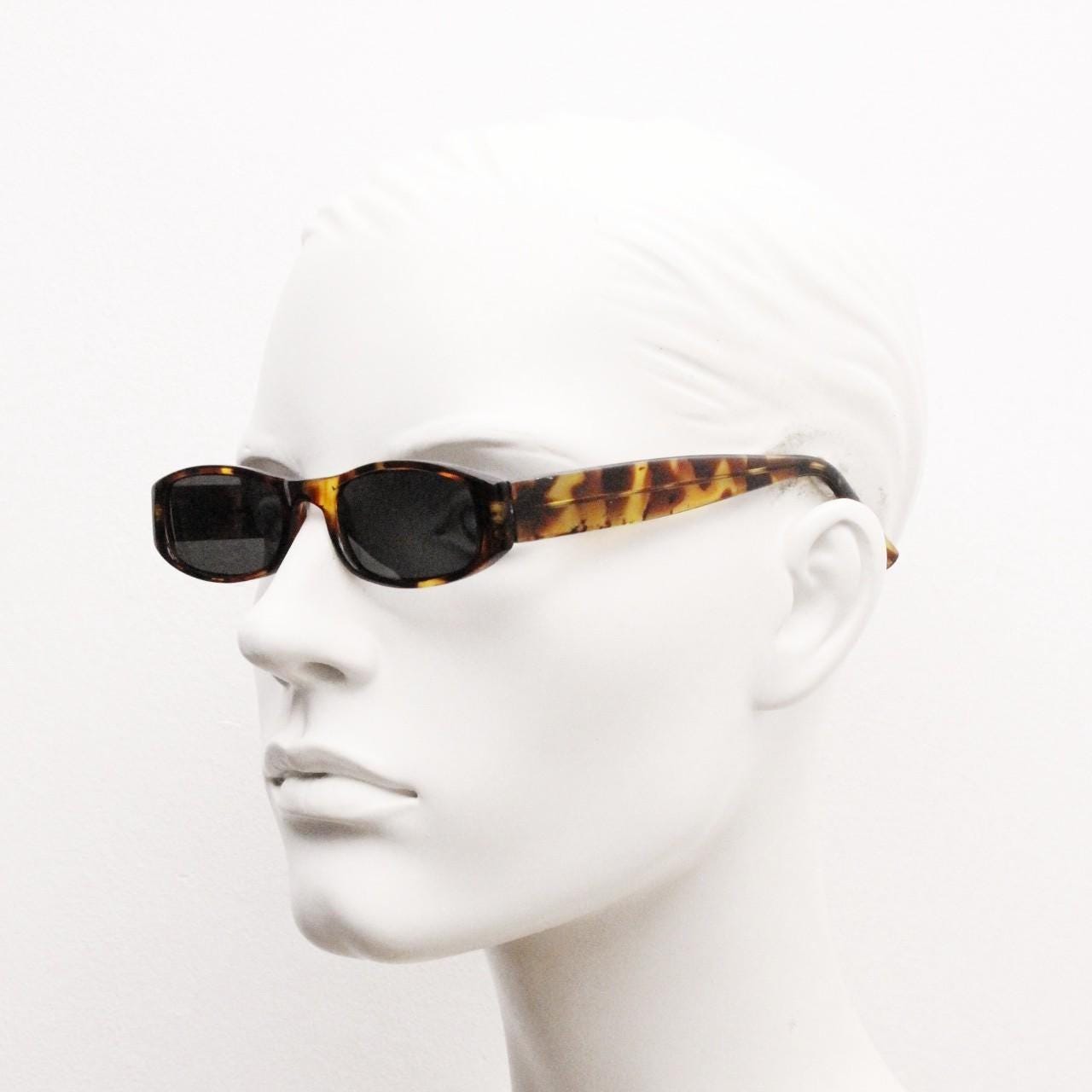90s vintage rectangular sunglasses. Authentic and sharp low profile vibrant tortoise frame with full height arms. BNWT Unused NOS