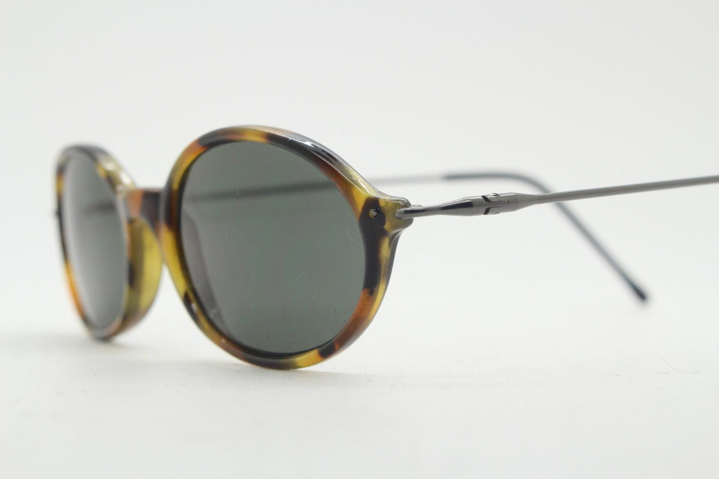 90s vintage oval sunglasses. Honey tortoise frame with refined slim 'industrial tech' style arms. Micro. Unused NOS