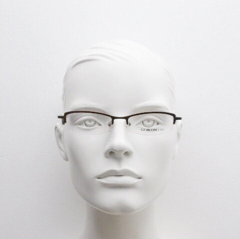 Osiris 90s vintage rectangular half rim eye glasses. Low profile optical frame in handsome brown chrome. Prescription RX Spectacles