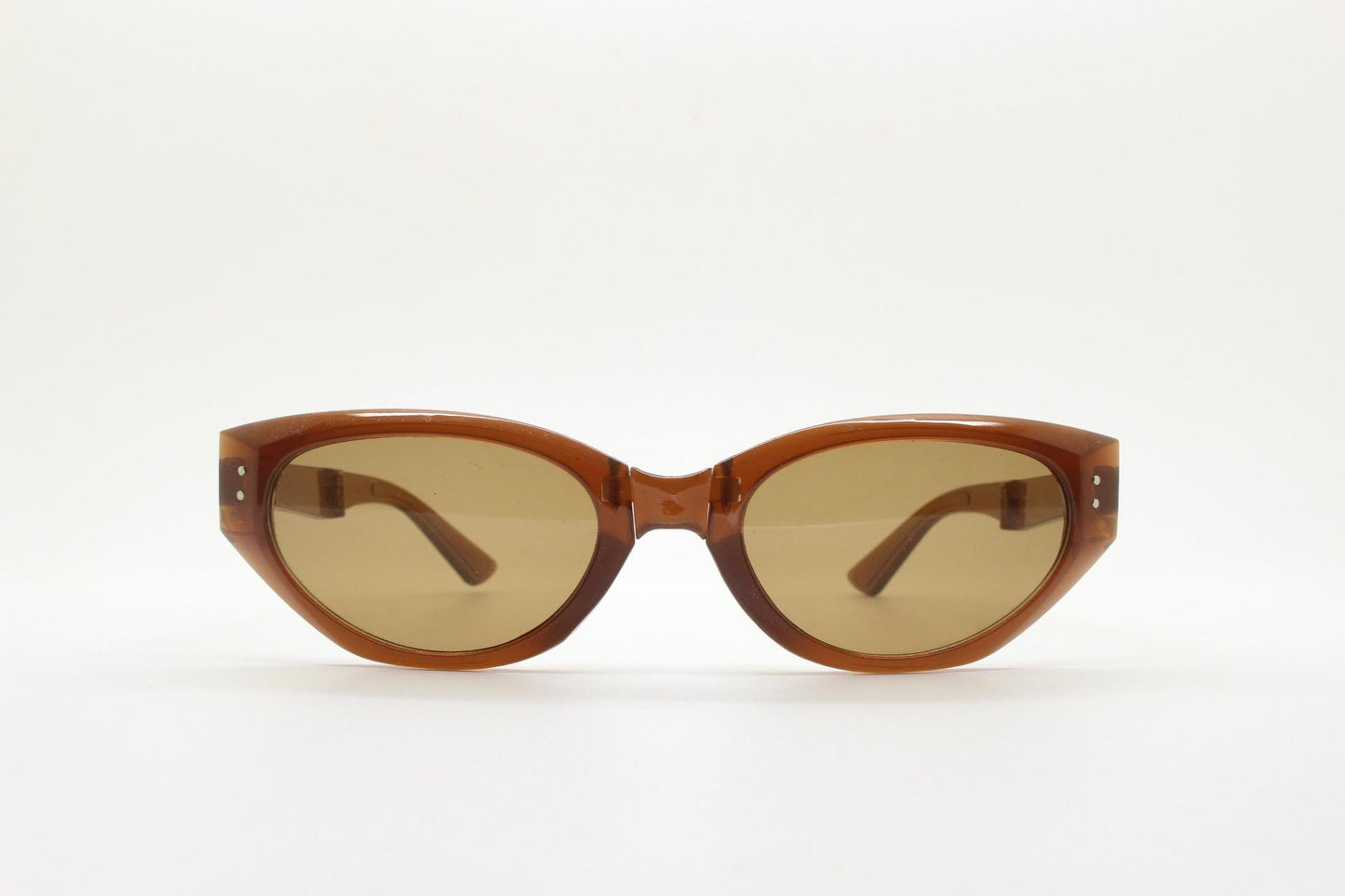 Vintage foldable cat eye sunglasses. Transparent brown folding compact cateye frame. Neat and clever folder design. Y2K NOS