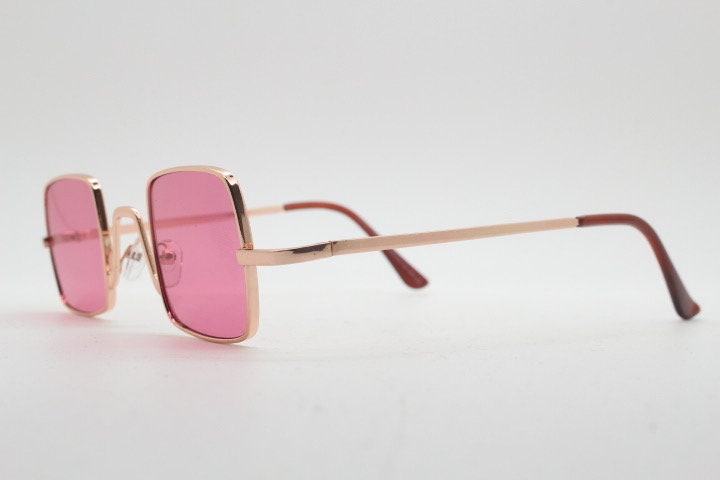 Y2K vintage small square sunglasses. Womens imposing minimal gold metal frame with pink lenses. Steampunk. Cosplay. Unused 2000s NOS
