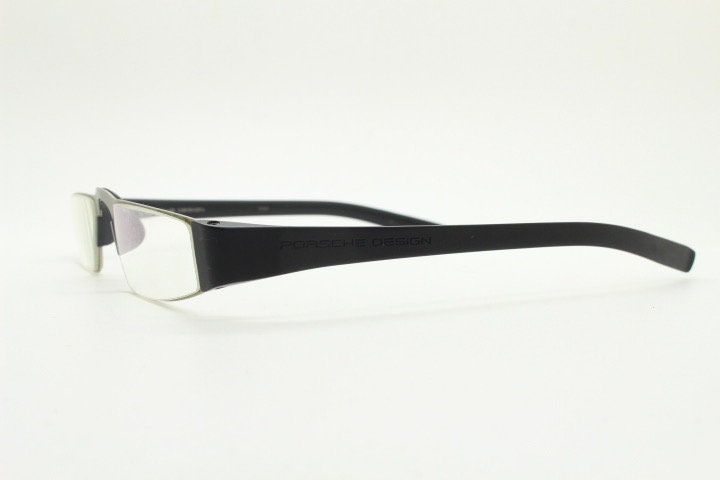 Porsche design rectangular eye glasses. Minimal grey metal optical frame in a matt finish with black arms. Vintage Prescription spectacles