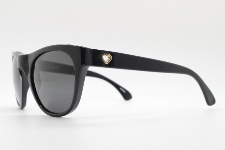 Linda Farrow Collaborations sunglasses with LUELLA. Limited production black acetate chunky wayfarer design with heart crests. NOS vintage