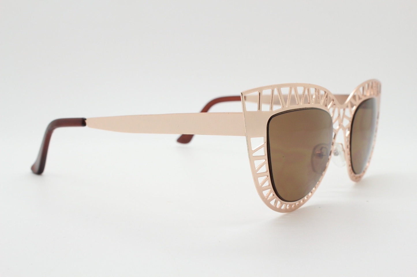 Y2K vintage metal cat eye sunglasses.  Women's extraordinary gold cut out lattice scaffold cateye frame with brown lenses. 2000s. BNWT