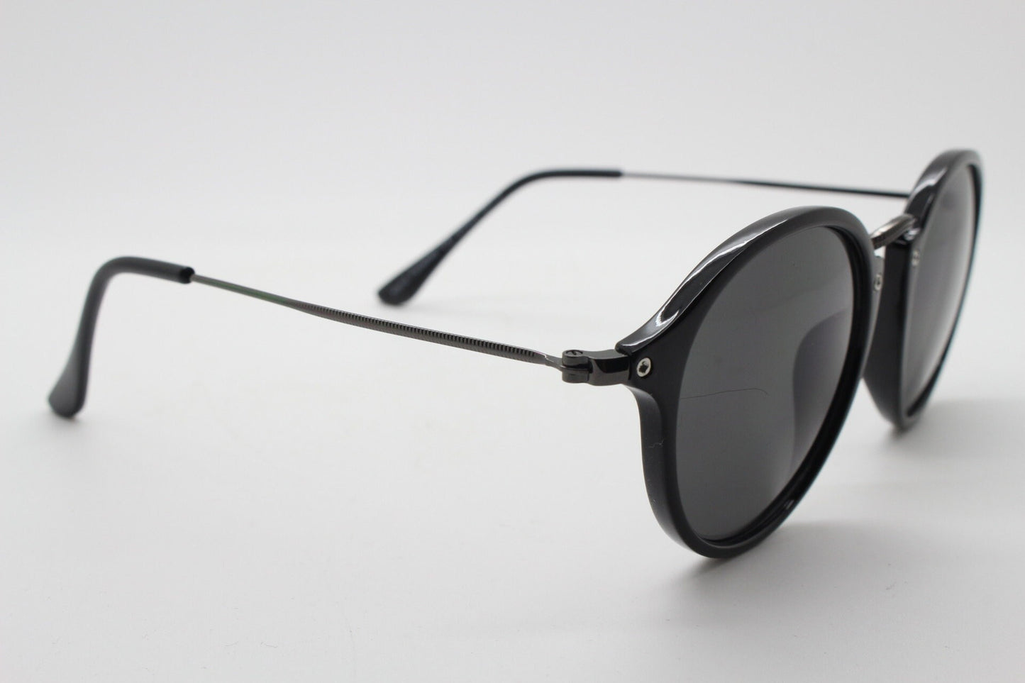 90s vintage round sunglasses. Black gloss slim 30s 40s design frame with metal bridge and dark lenses. Unused NOS
