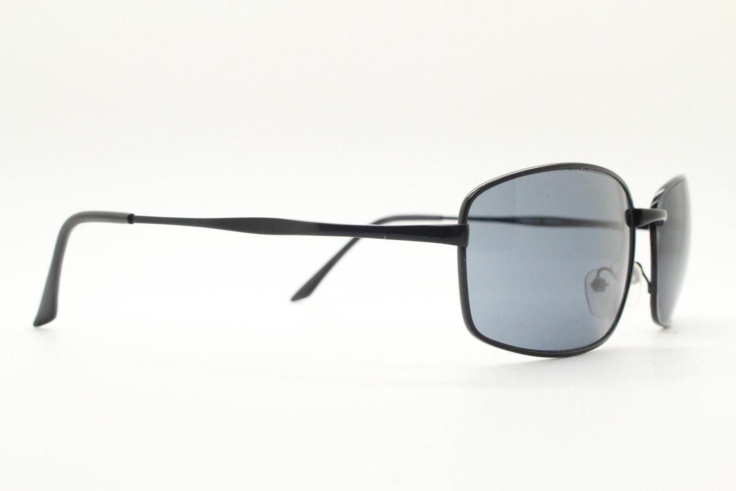 90s vintage wide rectangular sunglasses. Solid metal plain black gloss finish frame with curved lenses. 2000's. Y2K. NOS