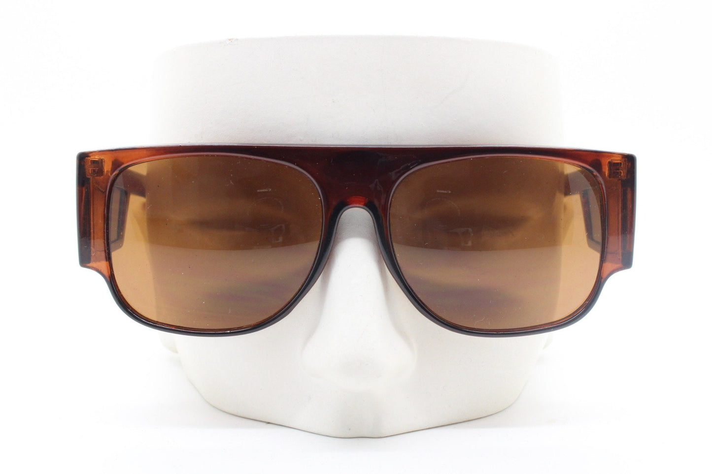 Y2K vintage rectangular side panel sunglasses. Brown transparent frame with matching lens tone blinkers. 2000s NOS unused goggle
