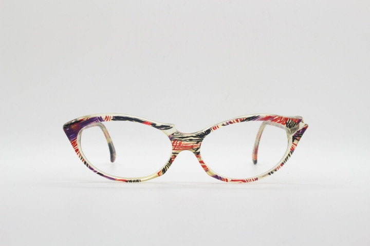 Alain Mikli Paris cat eye glasses made in France. Radical redefinition of the cateye optical frame. Womens prescription eyeglasses. RX