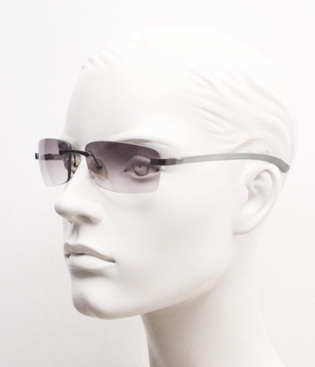 90s vintage minimal frameless sunglasses. Minimal mulberry rectangular lenses with gunmetal grey trim and frosted arms. Matrix shades